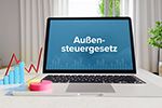 Laptop mit Anzeige Außensteuergesetz